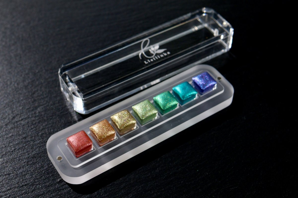 Lisilinka Opal Set — seven holographic watercolor pans in custom hexagon size, handmade in Germany
