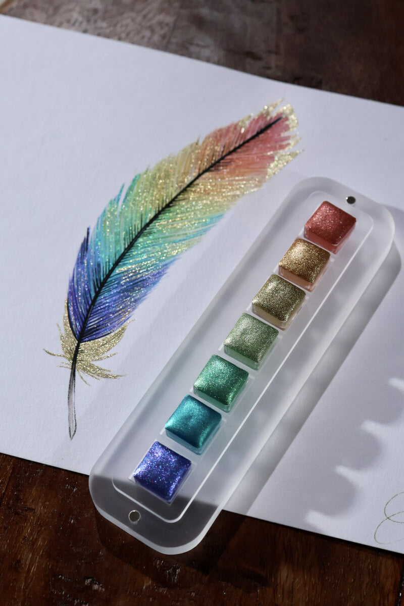 Iridescent fish painted with Lisilinka Opal holographic watercolors, showing color-shifting pigments