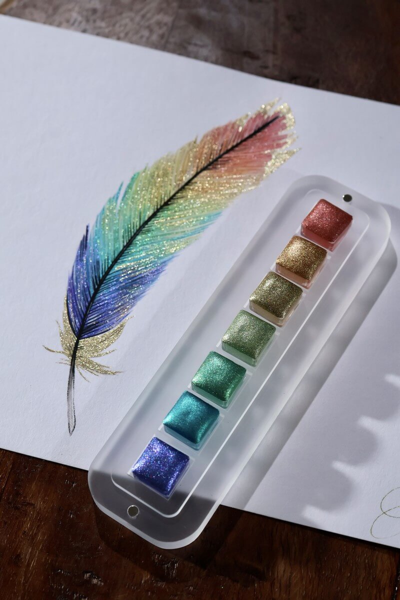 Rainbow feather painted with the Lisilinka Opal holographic watercolor set