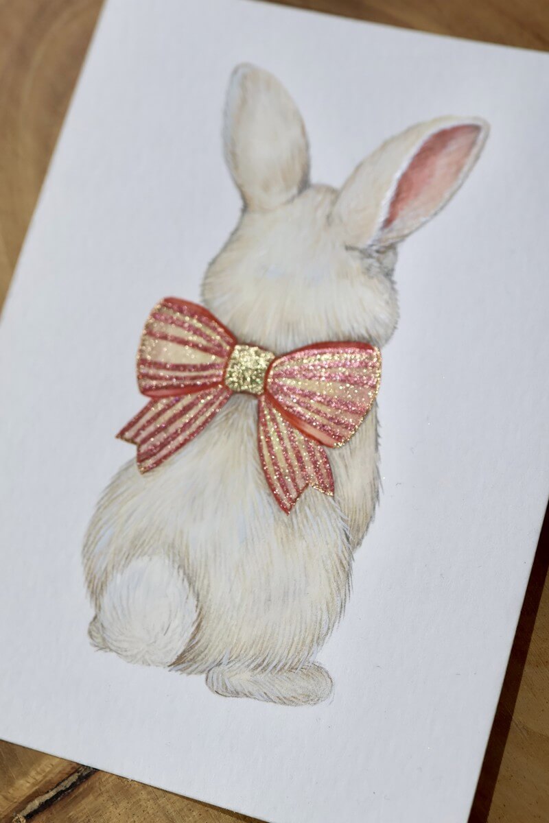 White bunny with a sparkling red bow painted with Lisilinka shimmer watercolors